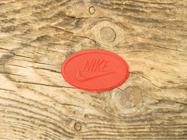 Термоаппликация Nike красная 6,5х4 см арт. 15940
