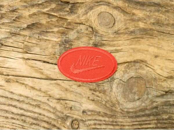 Термоаппликация Nike красная 5х3 см арт. 15961